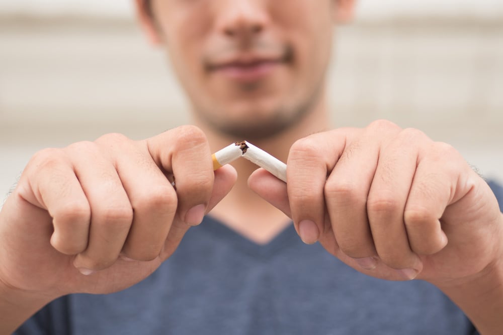 Brushing and flossing to prevent gum disease